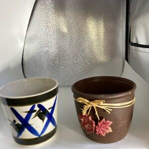 2 Flower pots grey is 5” x 5” brown 4.5” x 5.5” both lightly used